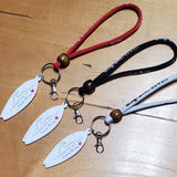 Three Surfboard shaped key chain wristlets.