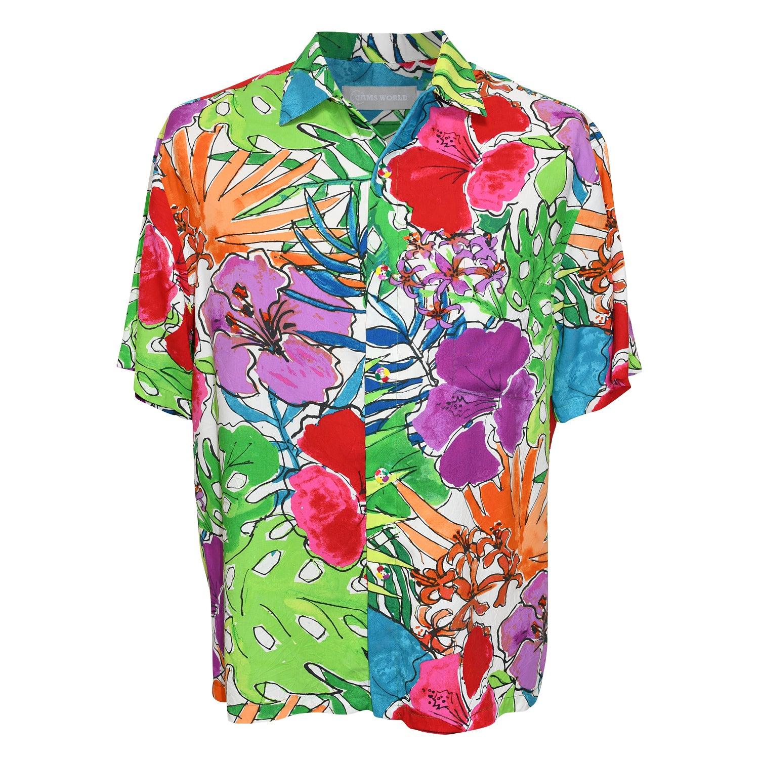 This is a product photo of a short-sleeved men's Hawaiian shirt laid flat against a white background. It features an extremely vibrant, all-over tropical pattern with large flowers and leaves in high-contrast colors like red, purple, orange, blue, and lime green.