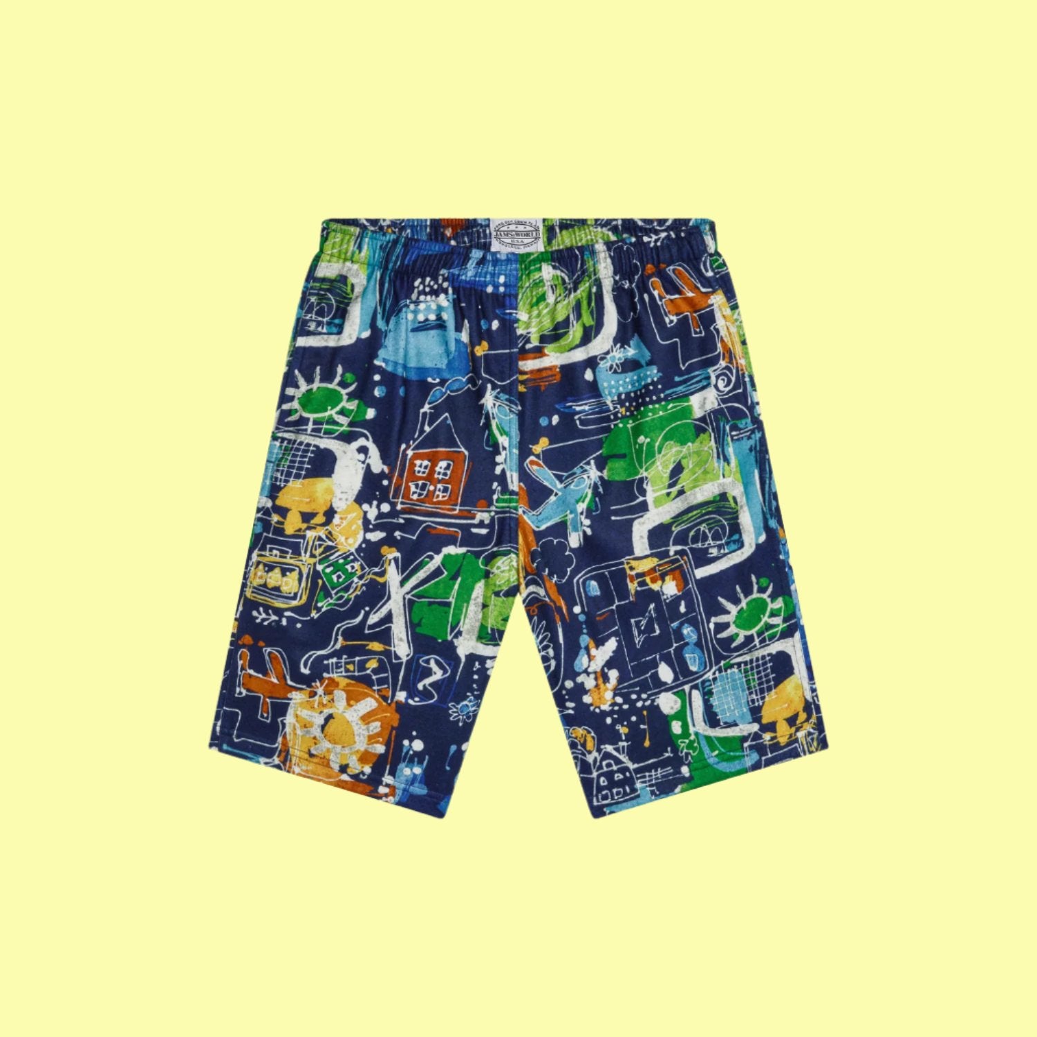 Product shot of a pair of shorts laid flat against a solid, light yellow background. The shorts are a dark fabric, primarily navy blue, covered in a vibrant, chaotic abstract print. The pattern uses bright colors like orange, yellow, lime green, and turquoise to depict small, doodle-like illustrations of objects, letters, and abstract shapes, giving the shorts a bold, energetic look. They have a casual fit and an elastic waistband.