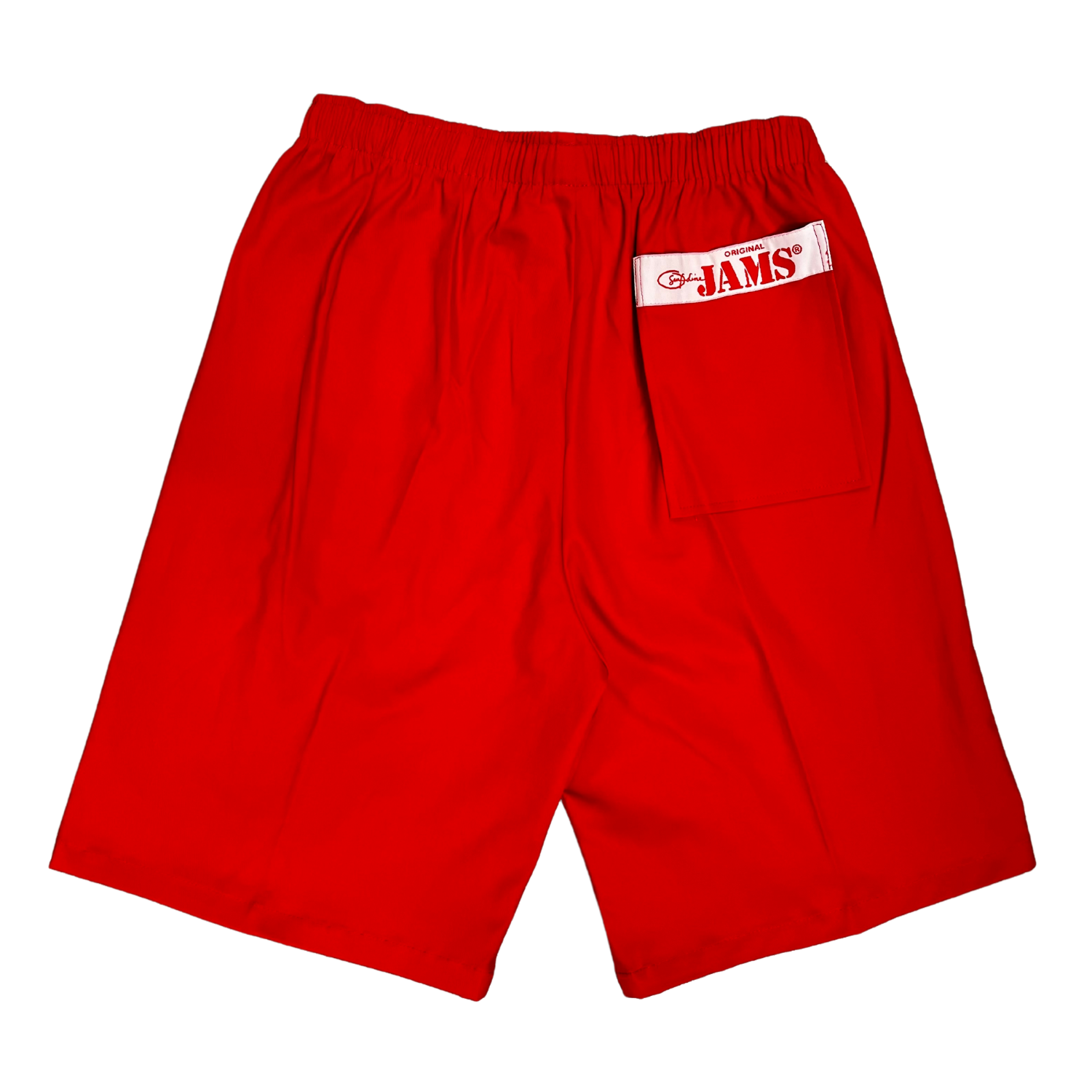 Back view of the same bright red athletic shorts, featuring a rectangular pocket on the right rear with a white label sewn onto it that reads "Original JAMS®". The shorts are laid flat against a white background.