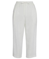 This is a product photo of a pair of plain white cropped pants shown flat against a white background. They have a relaxed fit, an elastic waistband, and a visible drawstring tie.