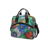 Colorful floral-patterned bag with black straps on a white background