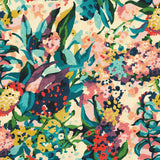 A detailed close-up of a dense, abstract floral and botanical fabric print. The pattern is rendered in a painterly, textured style, featuring a rich and bright color palette including teal, deep purple, vibrant magenta, sunny yellow, dark navy, and pops of red, all set against a cream background.
