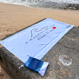 Dakota warrior of god logo on a beach towel.