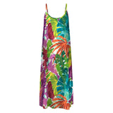 Colorful tropical leaf patterned dress on a white background