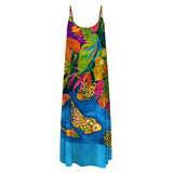 Vestido colorido con diseño de peces y hojas tropicales sobre fondo blanco.