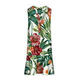 Vestido sin mangas con estampado floral tropical sobre fondo blanco.