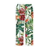 Tropical floral patterned pants on a white background
