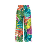 Colorful tropical leaf patterned pants on a white background