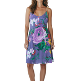 Woman wearing a floral dress with a purple background