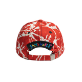 Red and white tie-dye cap with colorful 'Kamikaze' logo on a white background