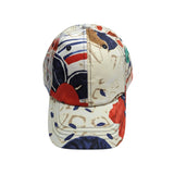 Colorful baseball cap with abstract pattern on a white background