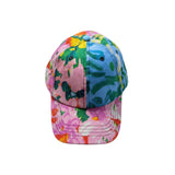 Colorful cap with floral and abstract patterns on a white background