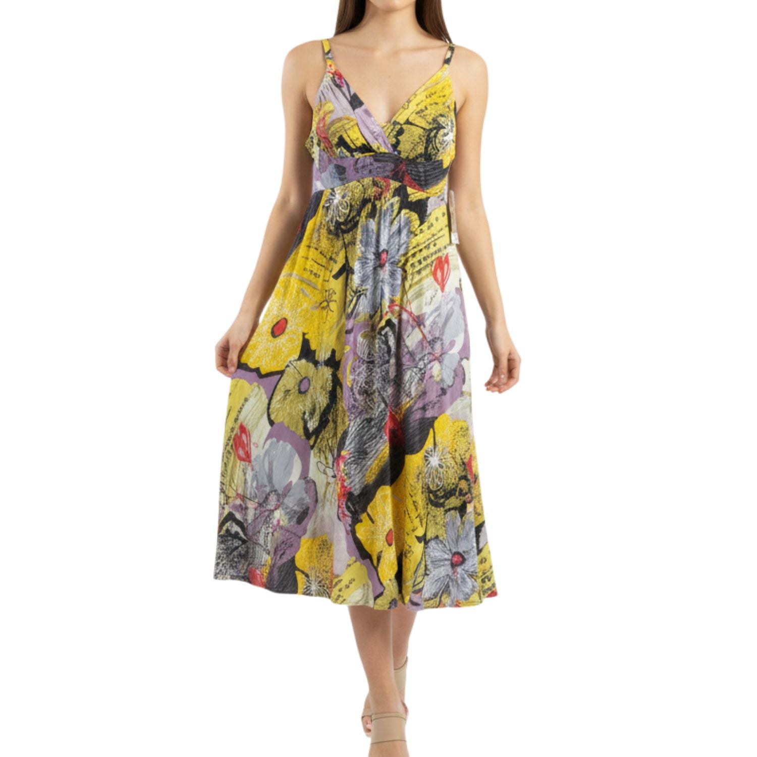 Woman wearing a colorful floral dress on a white background