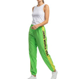 Person wearing green 'JAMS WORLD USA' pants with a white top on a white background