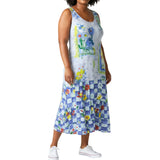 Woman wearing a floral dress with a checkered pattern on a white background
