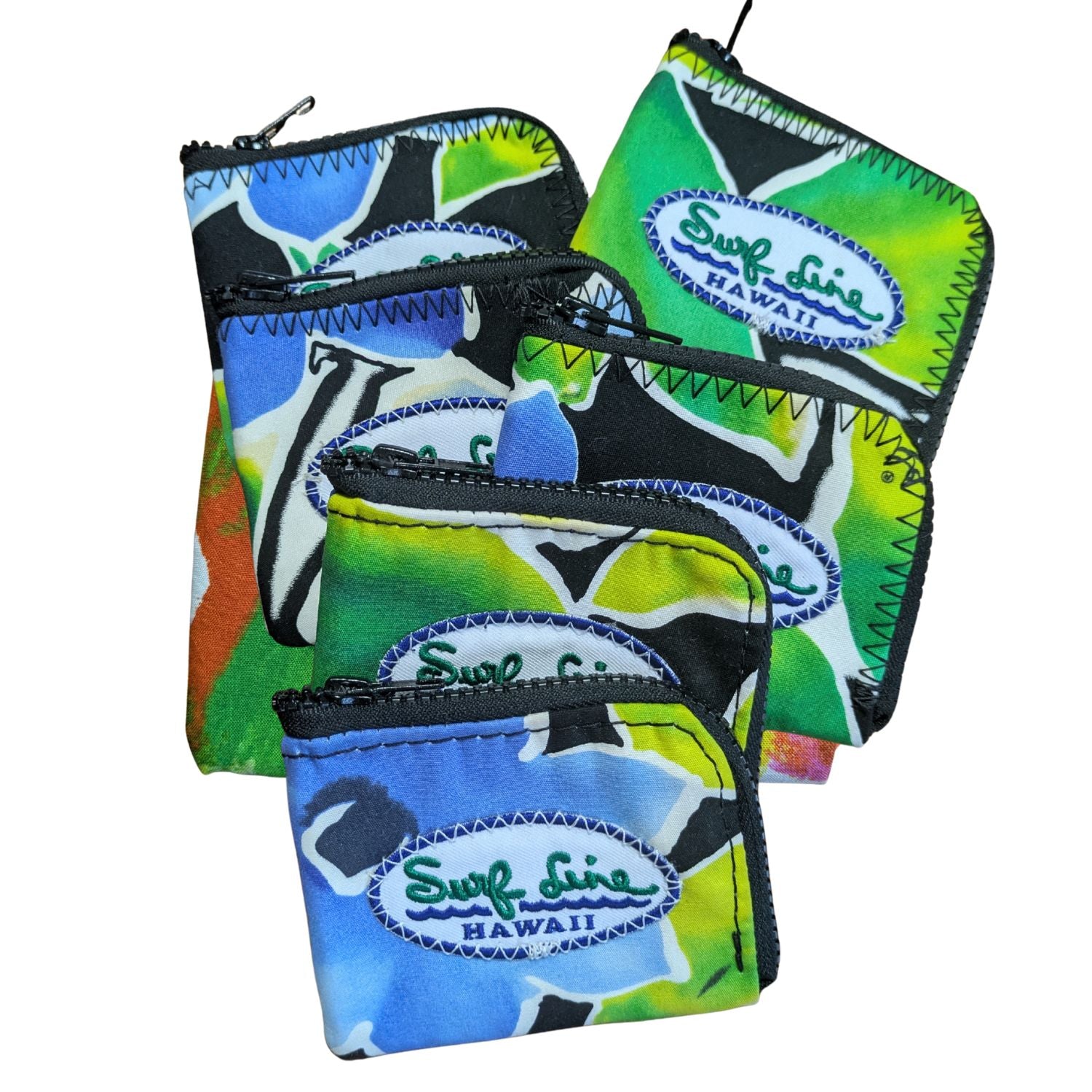 Juego de bolsas coloridas con la marca 'Surf Line Hawaii' sobre un fondo blanco