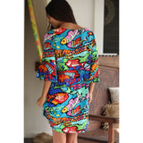 Woman wearing a colorful dress with fish pattern indoors