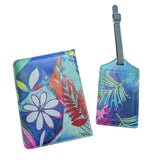 Floral patterned passport holder and luggage tag on a white background