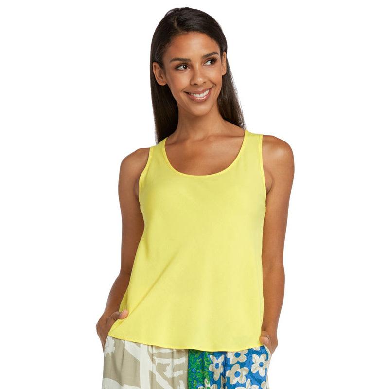 A woman modeling a bright yellow sleeveless tank top against a plain white background.