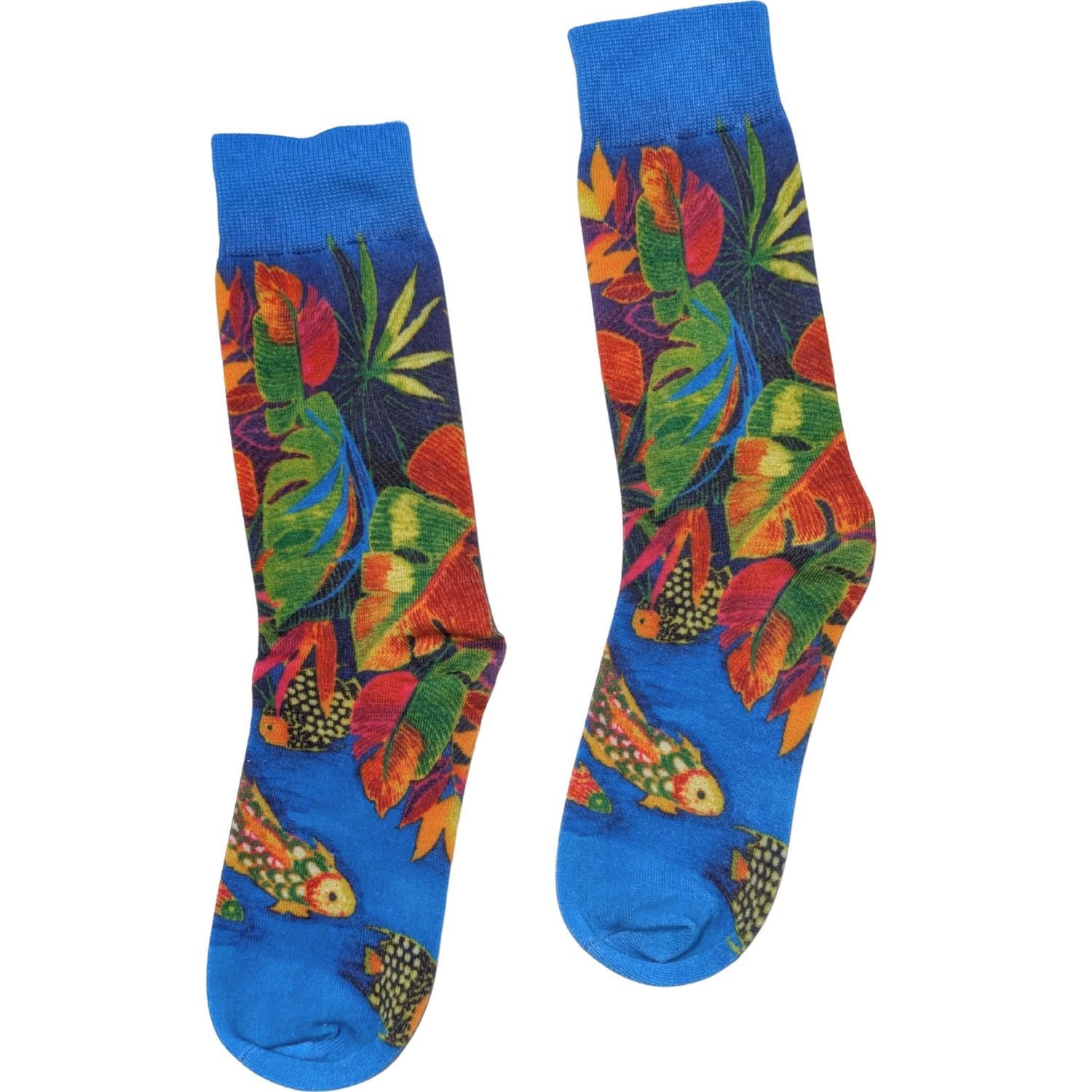 A pair of crew socks with a vibrant tropical design featuring colorful fish and large green leaves on a bright blue background, shown against a plain white background.