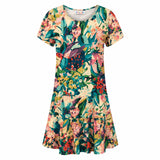 A short-sleeve A-line dress with a vibrant multicolor floral and botanical print, featuring a round neckline and a ruffled hem, shown against a plain white background.