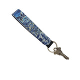 Blue graphic scenic print on a wristlet key chain
