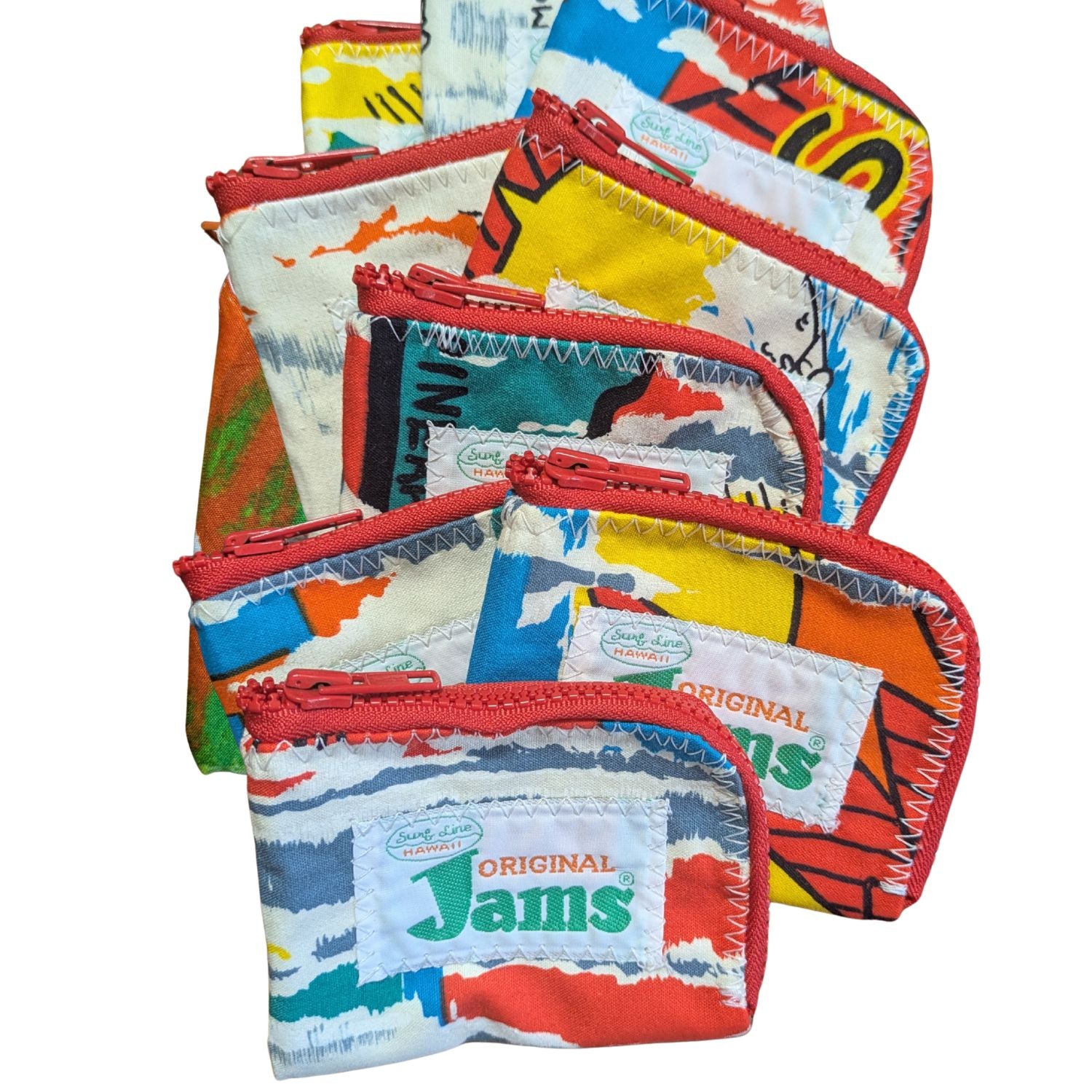 Bolsas de tela de colores con la marca 'Original Jams' sobre un fondo blanco
