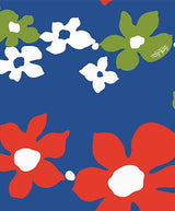A seamless textile pattern close-up featuring large, stylized, five-petal flowers scattered across a vibrant royal blue background. The flowers are in three colors: bright red, white, and olive green. A small “Surf Line HAWAII” logo is subtly printed in the center of one of the olive green flowers.
