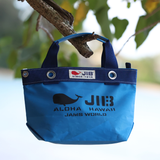 Blue bag with JIB branding hanging from a tree branch
