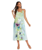 Woman wearing a floral dress on a white background