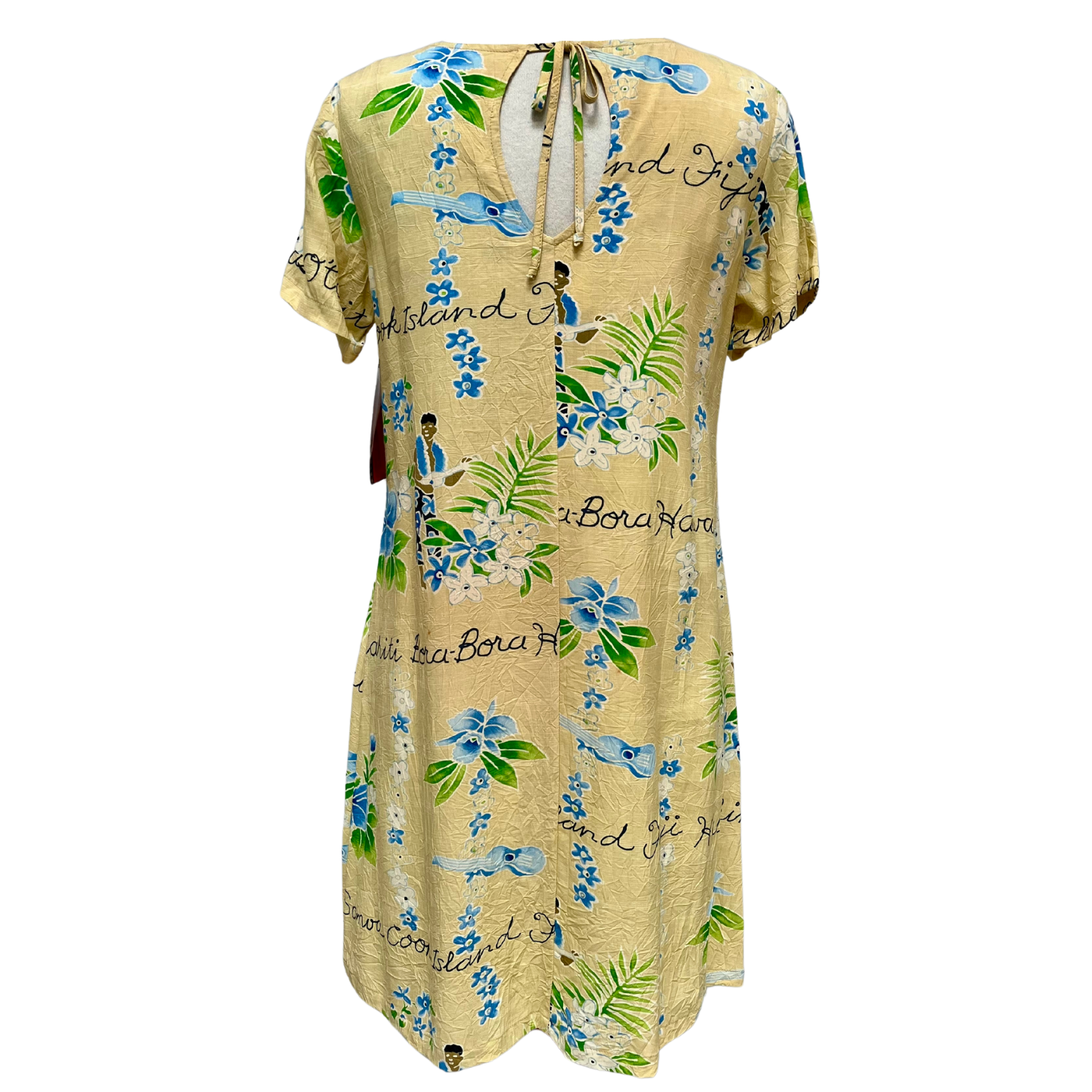 Robe Nicky beige des îles des années 2000