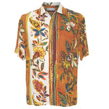 Colorful patterned shirt with floral design on a white background